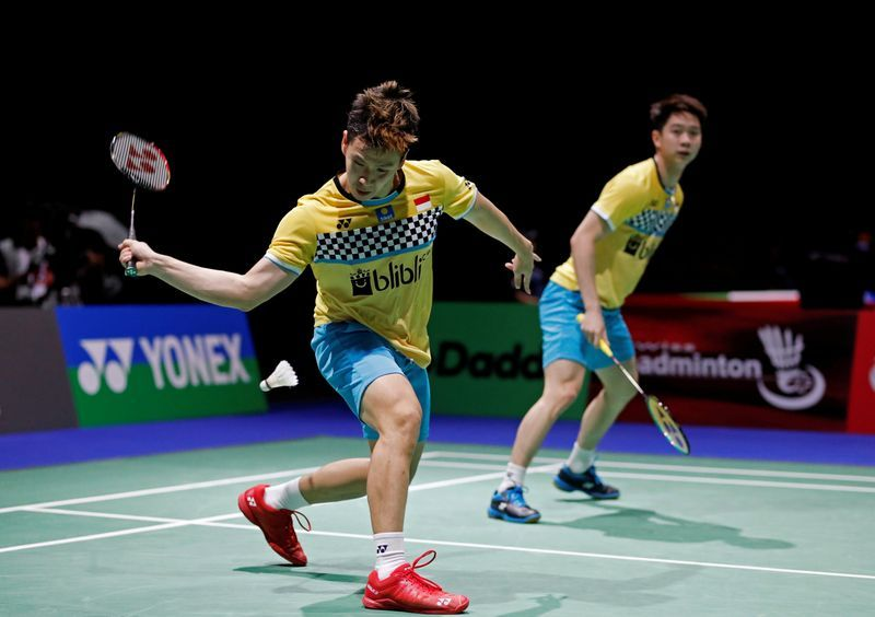 Shirt and Shorts Are A Common Badminton Outfit For Men.
